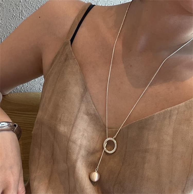 シルバー円形モチーフロングネックレス
